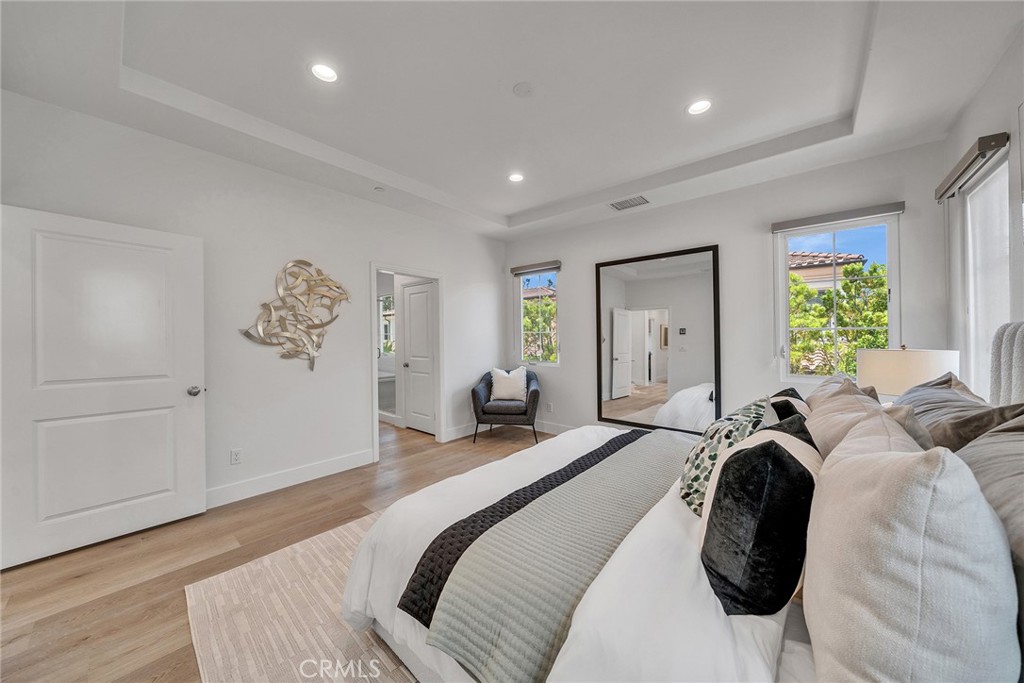 55 Open Range Irvine, CA 92602 - Photo 36 of 66 a bedroom with bed and window