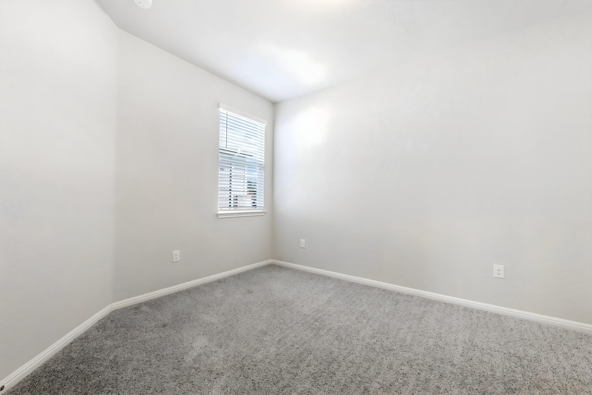 14409 Frankel Loop, Unit 33A Pflugerville, TX 78660 - Photo 18 of 29 This is the 3rd bedroom behind the double doors upon entering the house