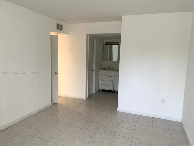 an empty room with closet