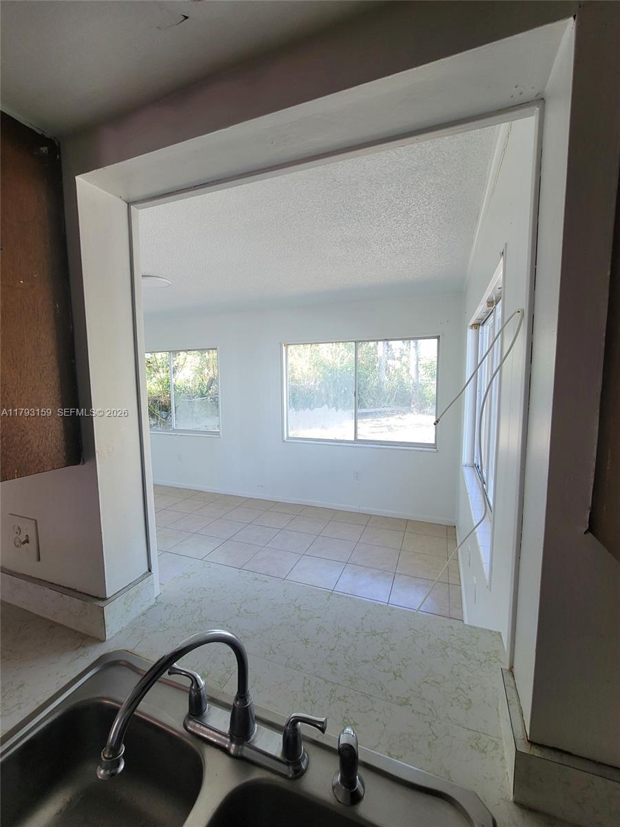 1112 Evanston Street Sebring, FL 33870 - Photo 20 of 41 a view of an empty room and window