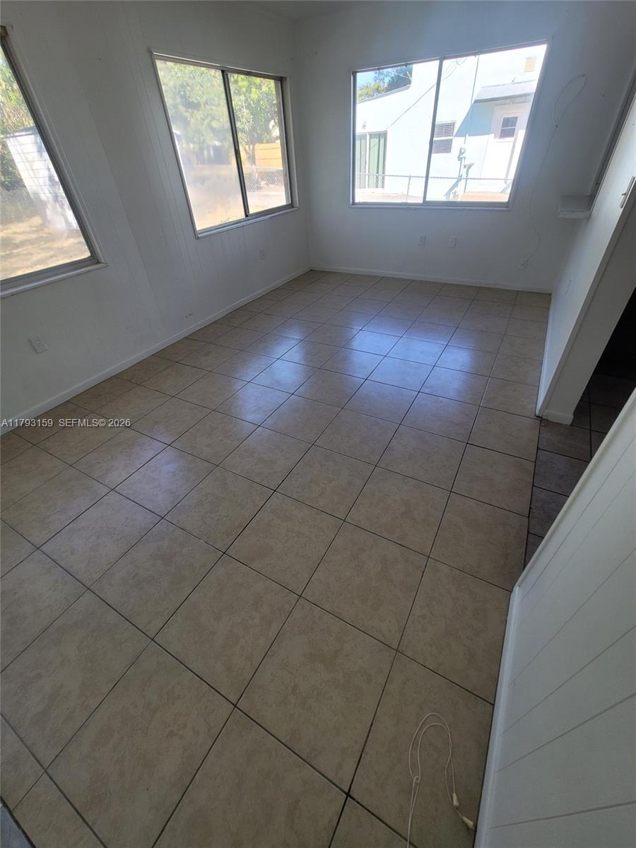1112 Evanston Street Sebring, FL 33870 - Photo 24 of 41 an empty room with windows
