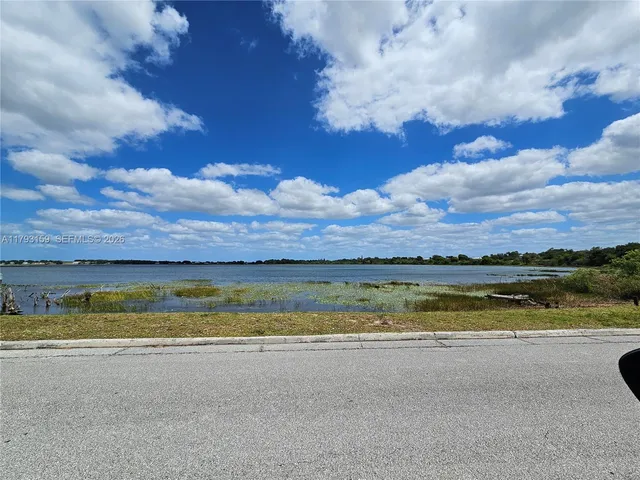 a view of an lake and a houses
