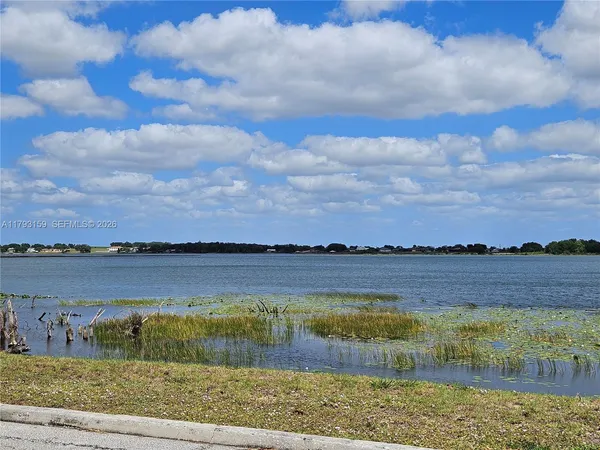a view of lake with mountain