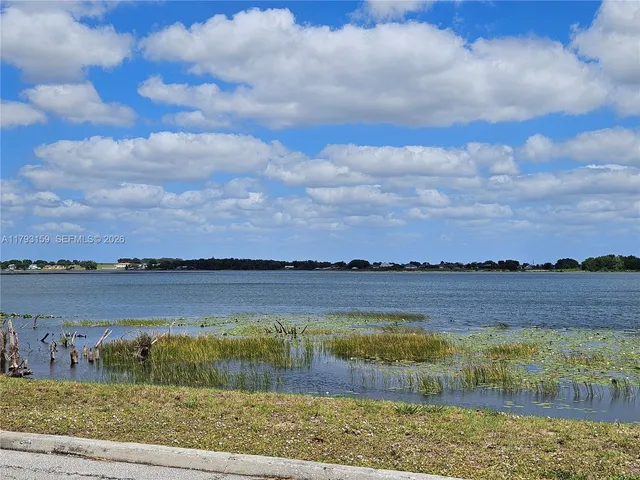 a view of lake with mountain
