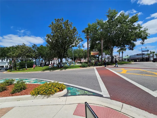 a view of a street with cars