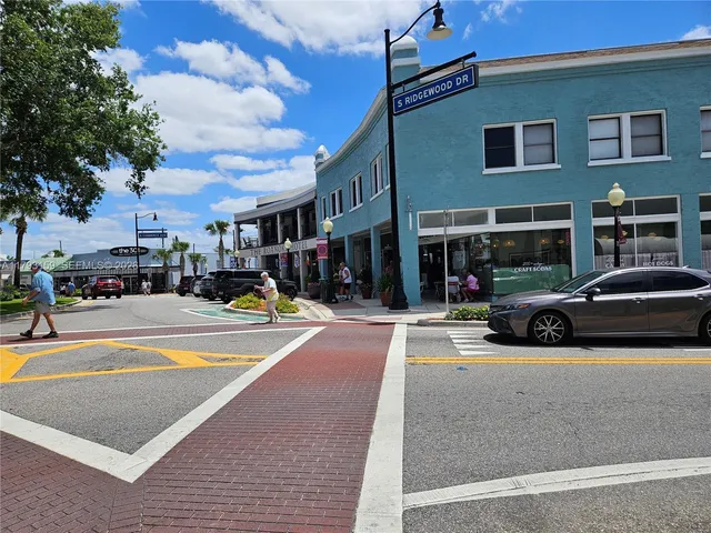 a view of street with sitting area
