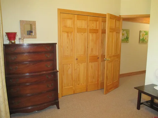 a bathroom with a sink a mirror and a toilet
