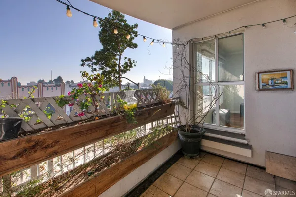 a view of a balcony with an outdoor space