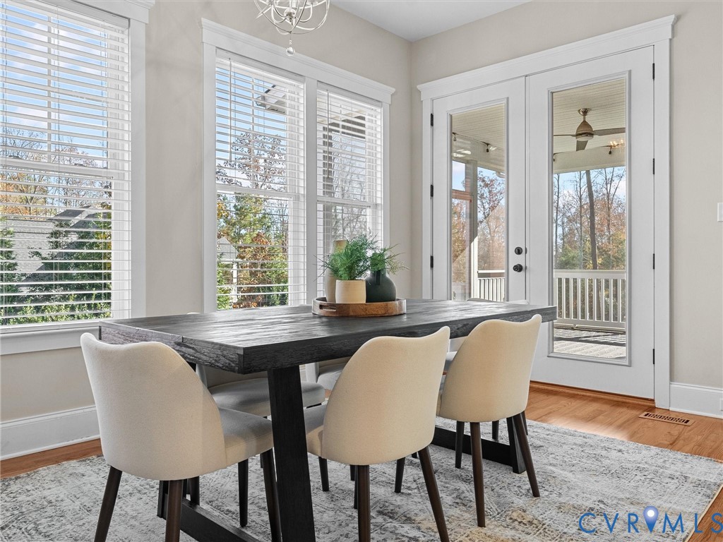 2001 Tulip Hill Drive Midlothian, VA 23112 - Photo 17 of 50 a view of a dining room with furniture and wooden floor