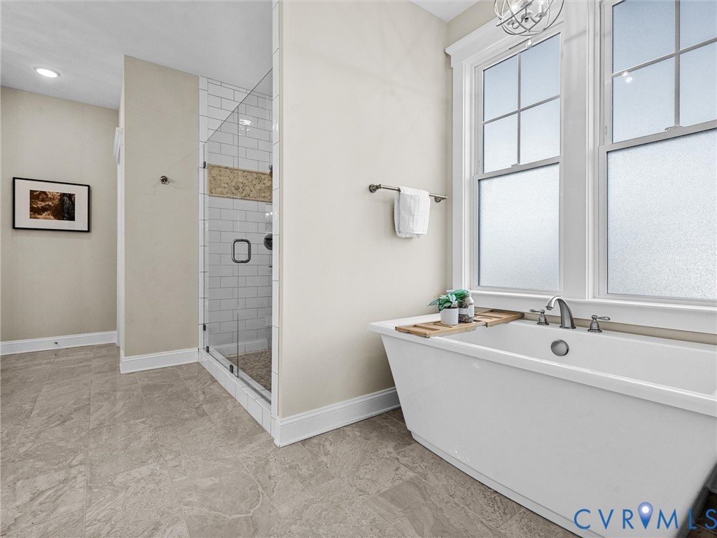 2001 Tulip Hill Drive Midlothian, VA 23112 - Photo 31 of 50 a bathroom with a tub sink shower and mirror