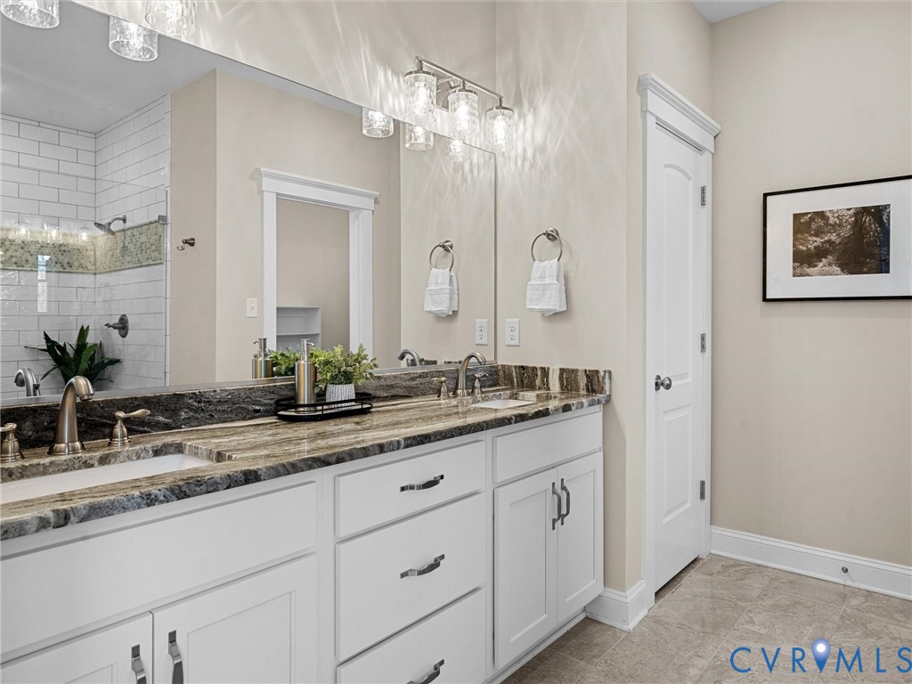 2001 Tulip Hill Drive Midlothian, VA 23112 - Photo 34 of 50 a bathroom with a granite countertop sink mirror and double