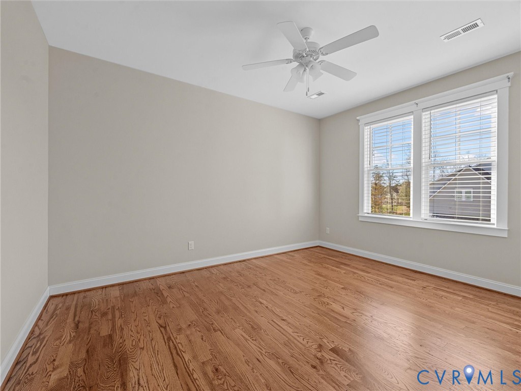 2001 Tulip Hill Drive Midlothian, VA 23112 - Photo 37 of 50 wooden floor in an empty room with a window
