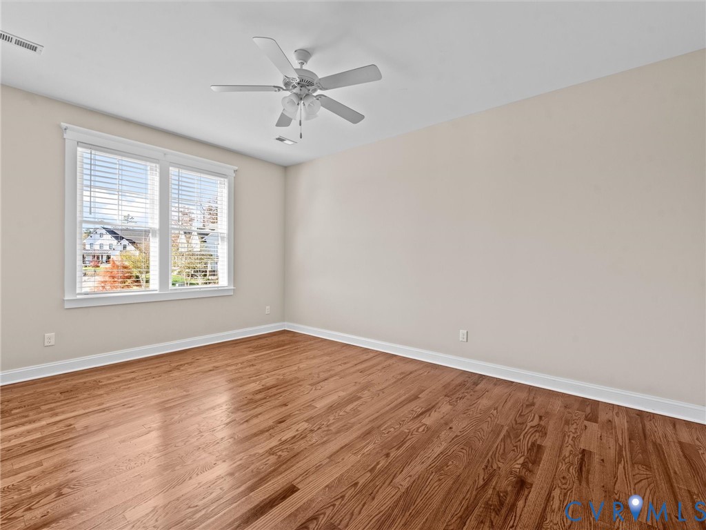 2001 Tulip Hill Drive Midlothian, VA 23112 - Photo 40 of 50 wooden floor in an empty room with a window