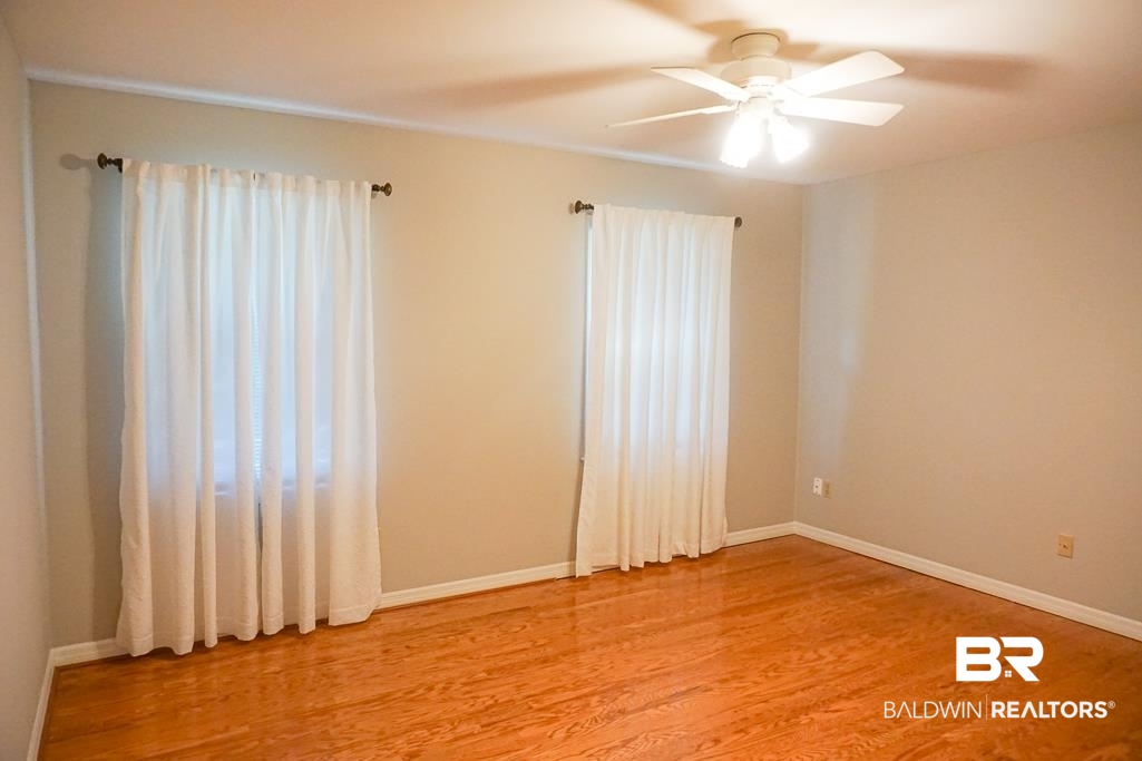 255 Suffolk Road Mobile, AL 36608 - Photo 23 of 29 Spare room featuring light wood-style flooring and ceiling fan
