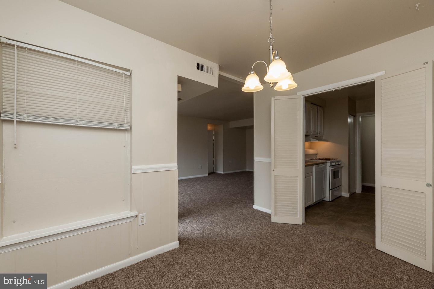 3827 St Barnabas Road, Unit T Suitland, MD 20746 - Photo 14 of 15 Spacious living area with modern charm.