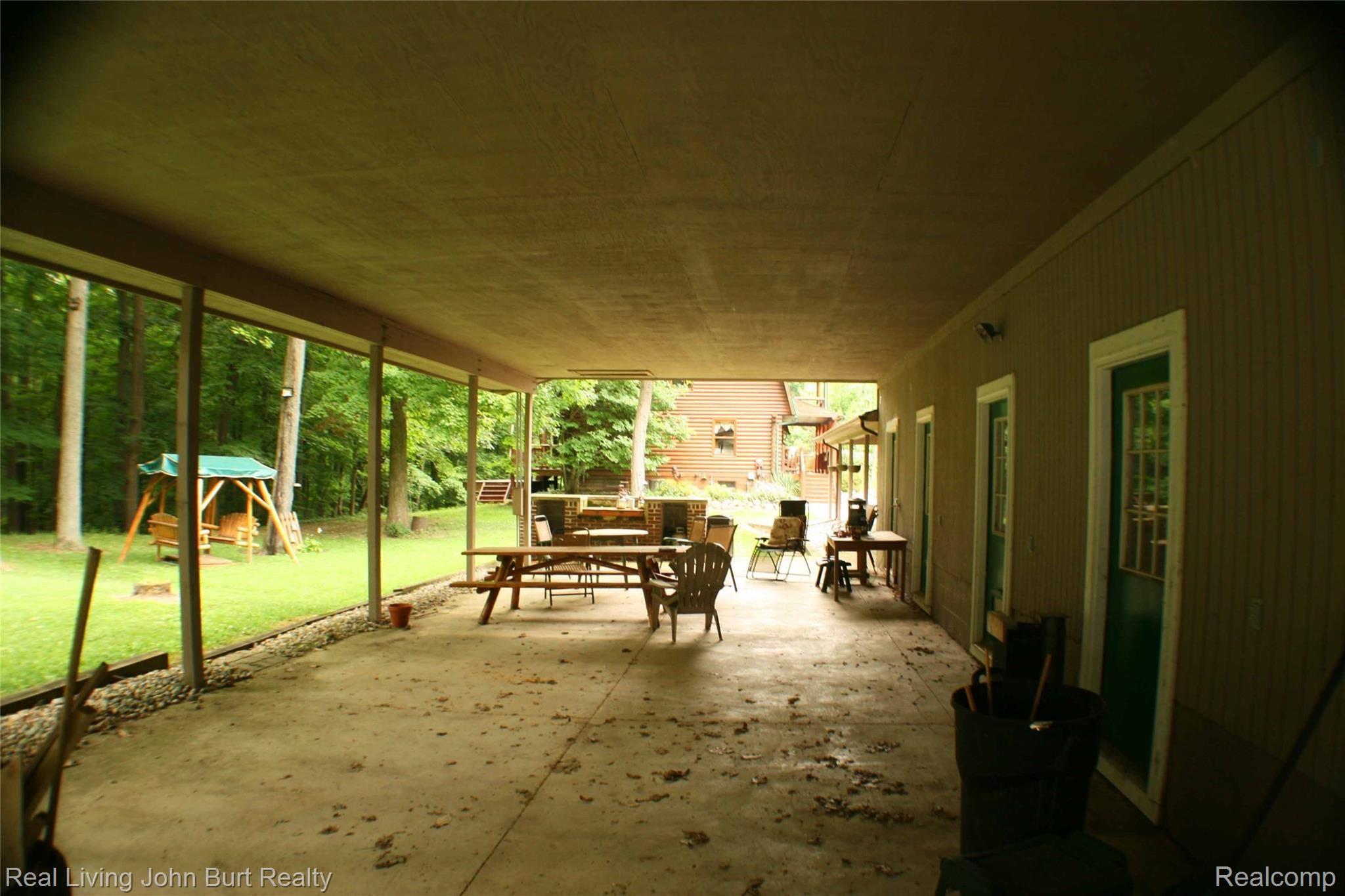 1605 Shoup Road Leonard, MI 48367 - Photo 23 of 37 23'x50' pavilion perfect for enjoying nature in any weather, new roof too!