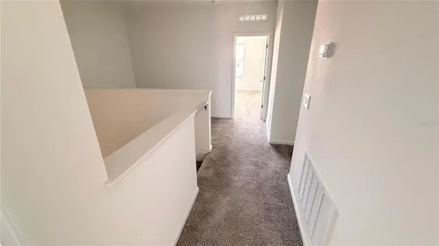 a view of a house with a balcony