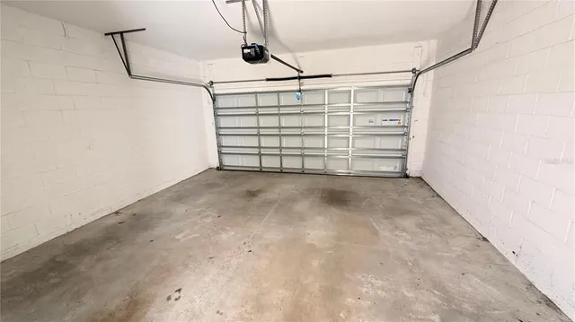 a very nice looking bedroom with a large window