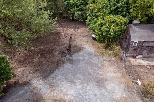 a backyard of a house with lots of green space