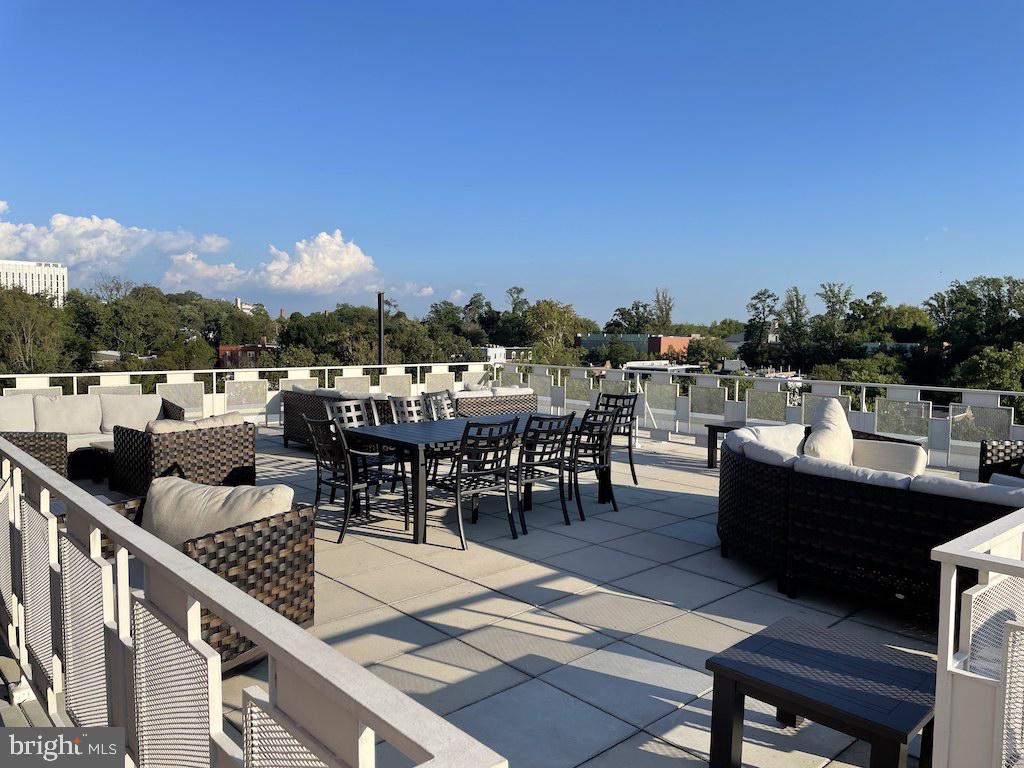 4000 Tunlaw Road Northwest, Unit 516 Washington, DC 20007 - Photo 14 of 35 a view of a roof deck with furniture