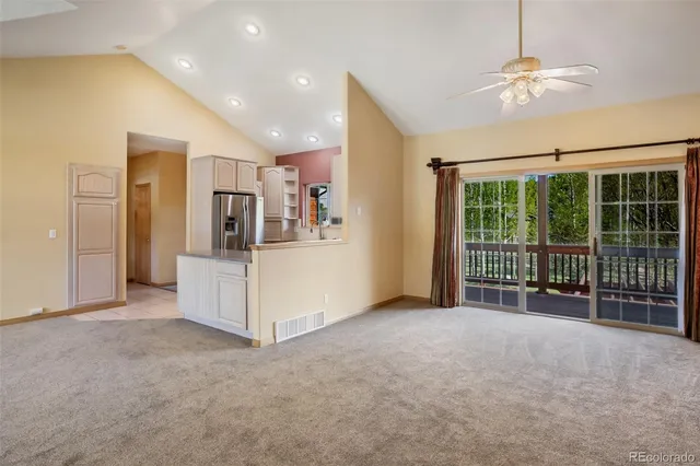 a view of a livingroom with a staircase