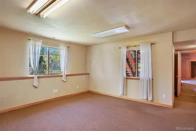 a view of balcony with wooden floor