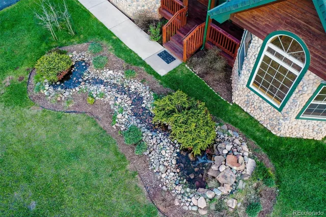 a backyard of a house with lots of green space