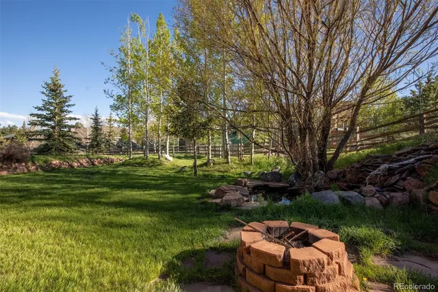 a garden view with a seating space