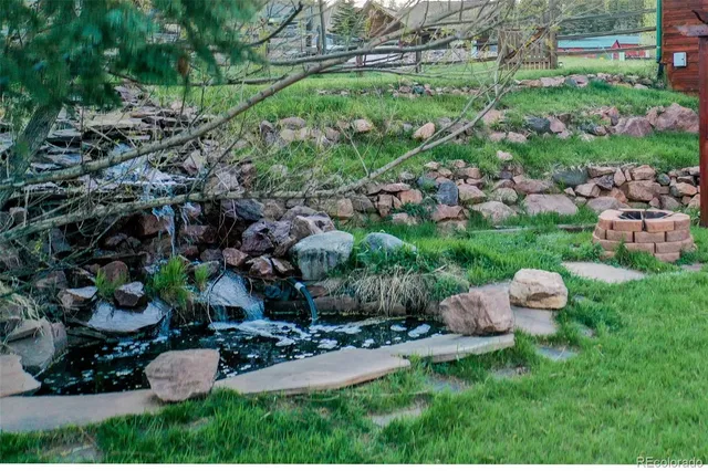 a view of a town with mountains in the background