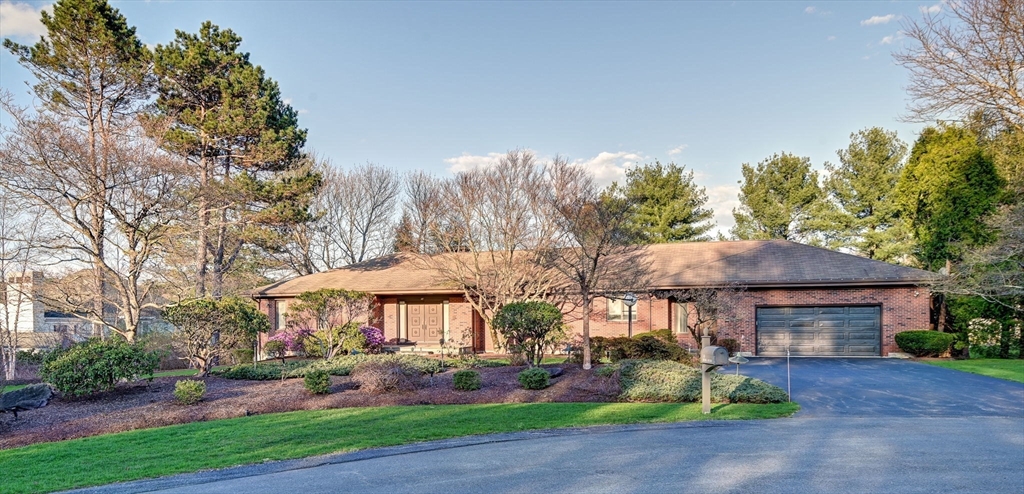 14 Seneca Road Canton, MA 02021 - Photo 2 of 42 a front view of a house with garden