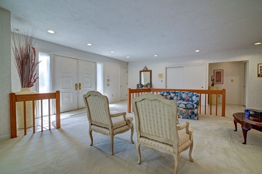 14 Seneca Road Canton, MA 02021 - Photo 21 of 42 a living room with furniture and a window