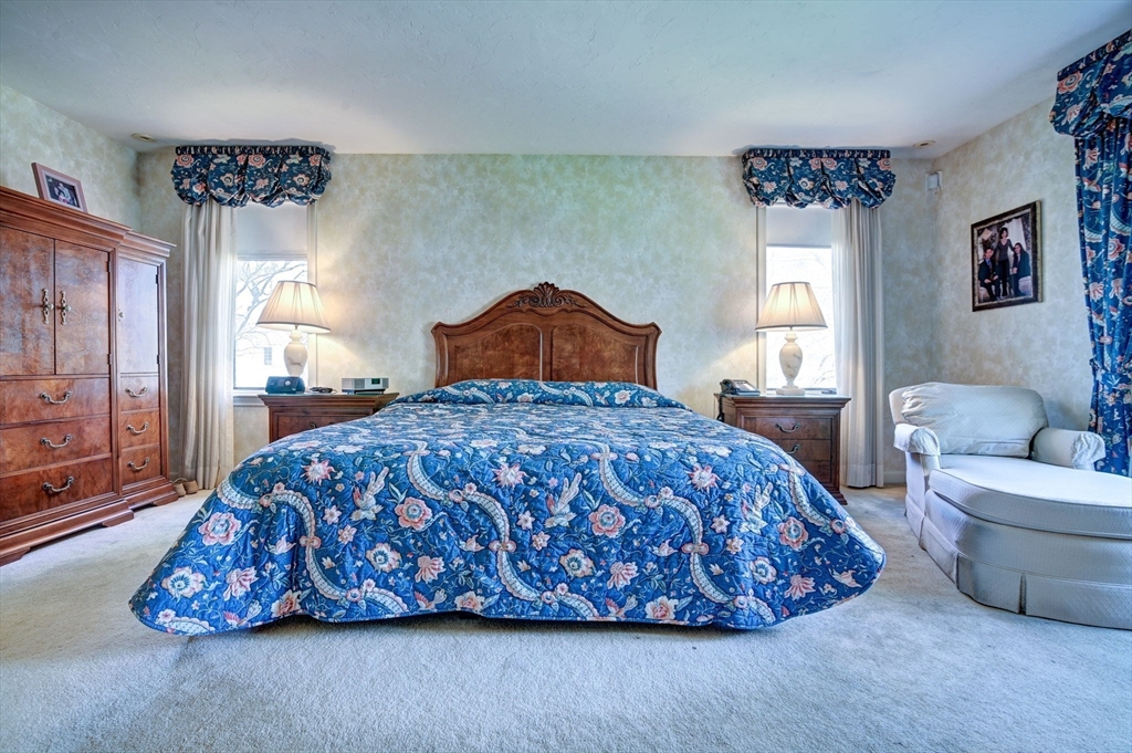 14 Seneca Road Canton, MA 02021 - Photo 22 of 42 a bedroom with a bed and window