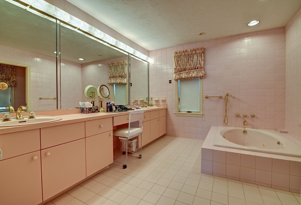 14 Seneca Road Canton, MA 02021 - Photo 23 of 42 a bathroom with a double vanity sink mirror and bathtub