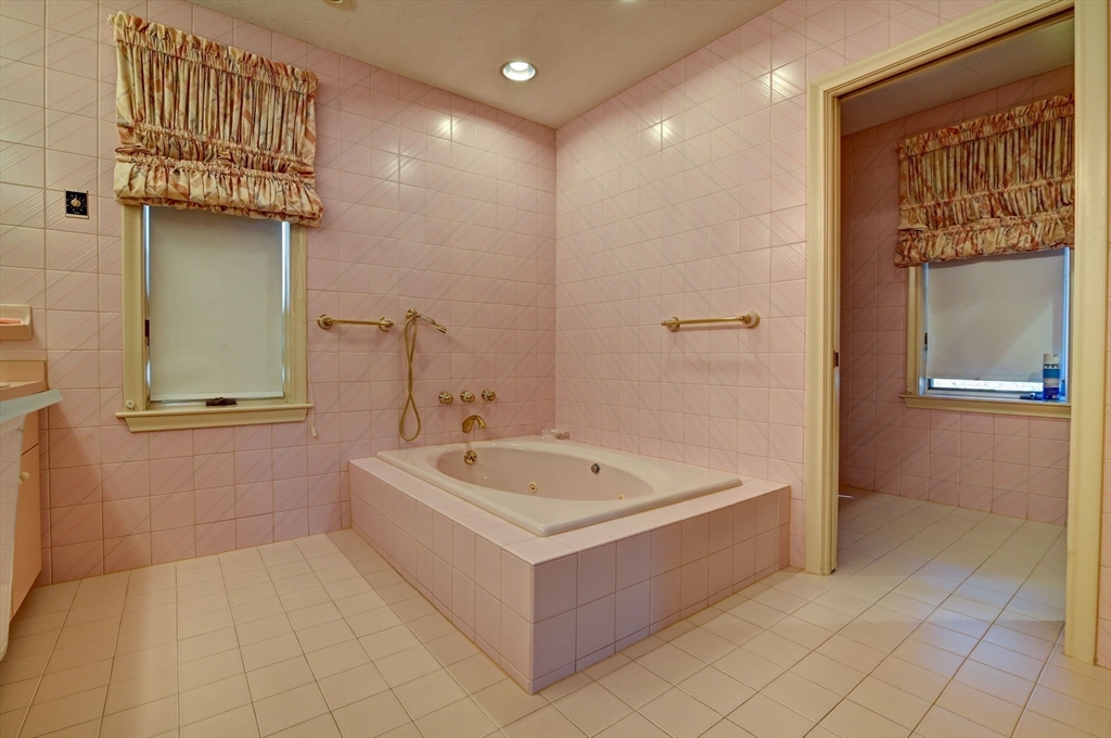14 Seneca Road Canton, MA 02021 - Photo 24 of 42 a spacious bathroom with a tub a sink and mirror