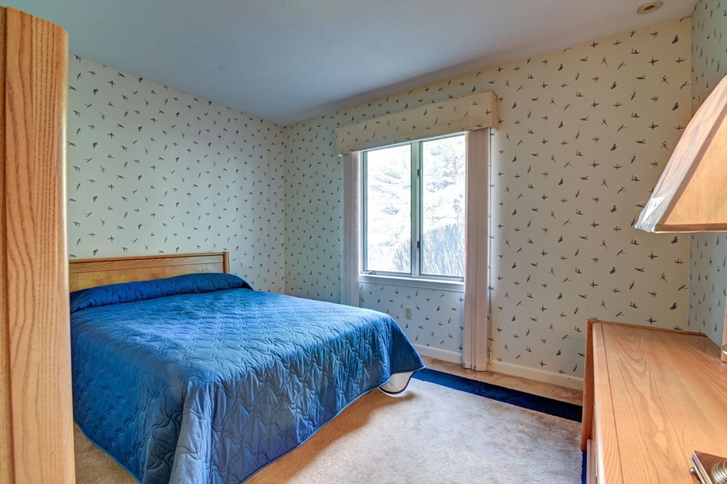 14 Seneca Road Canton, MA 02021 - Photo 29 of 42 a bedroom with a bed and a window