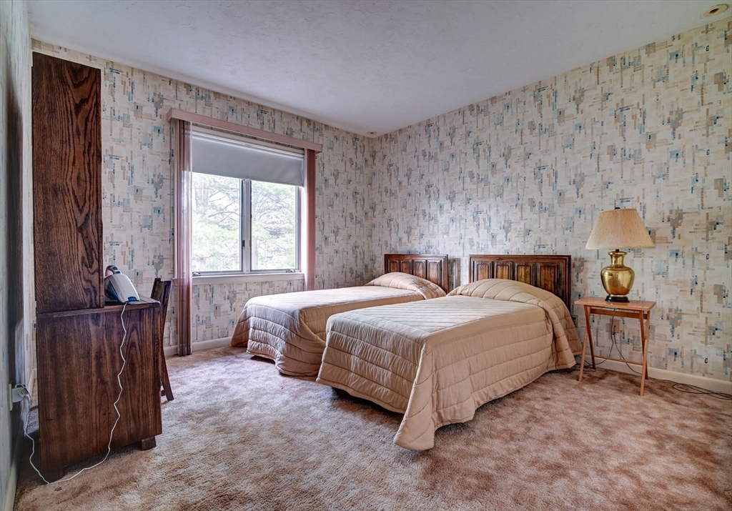 14 Seneca Road Canton, MA 02021 - Photo 30 of 42 a bedroom with a bed and window