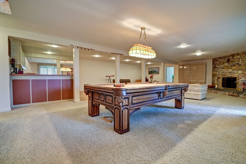 14 Seneca Road Canton, MA 02021 - Photo 33 of 42 a living room with furniture a table and kitchen view