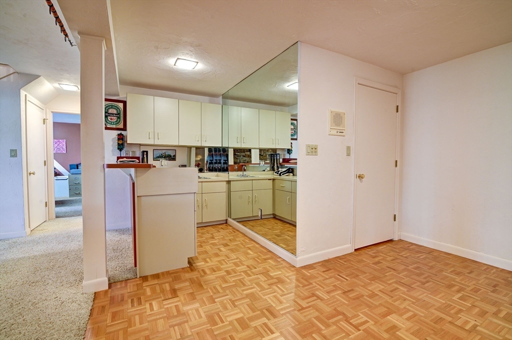 14 Seneca Road Canton, MA 02021 - Photo 37 of 42 a kitchen with stainless steel appliances a refrigerator and a sink