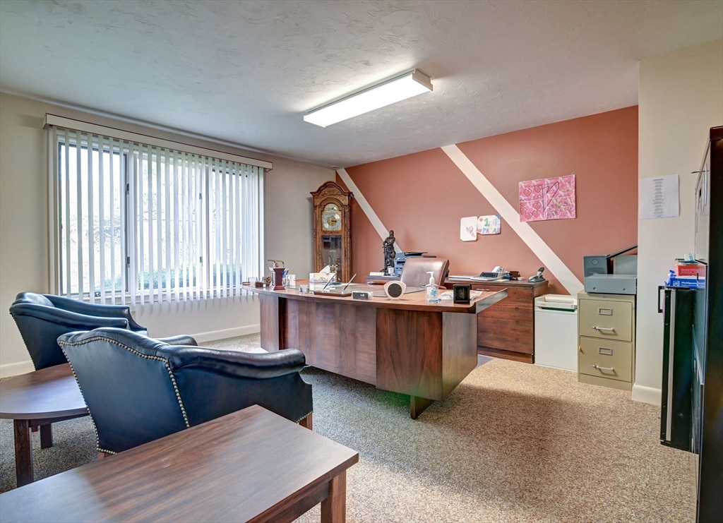 14 Seneca Road Canton, MA 02021 - Photo 39 of 42 a room with furniture and a window