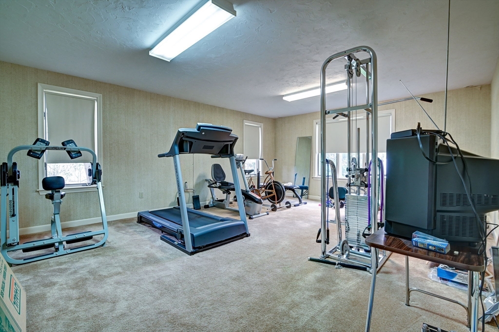 14 Seneca Road Canton, MA 02021 - Photo 42 of 42 a view of a room with gym equipment