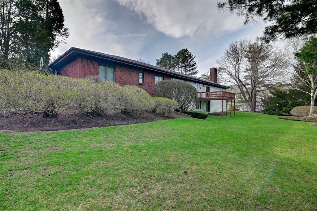 14 Seneca Road Canton, MA 02021 - Photo 8 of 42 a view of a house with backyard and garden