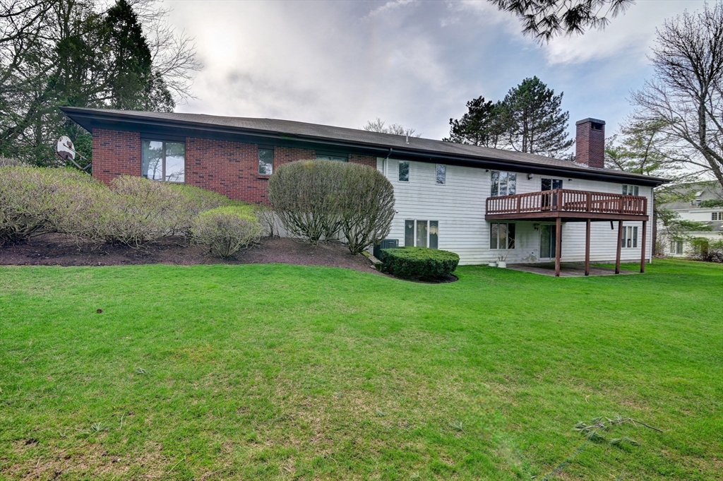 14 Seneca Road Canton, MA 02021 - Photo 10 of 42 a view of a yard in front of a house with large tree