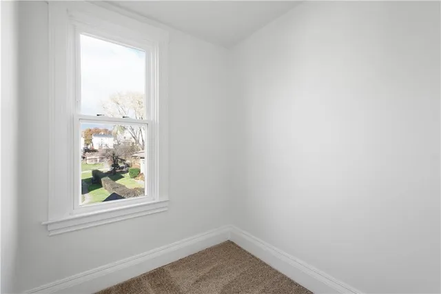 an empty room with window