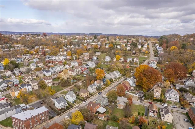 an aerial view of residential building and street