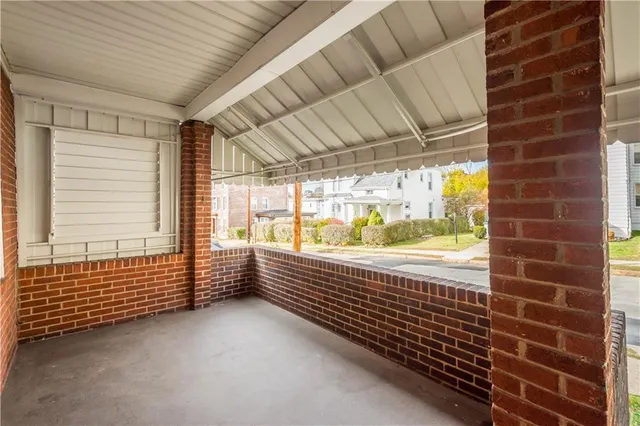 a view of a room with windows