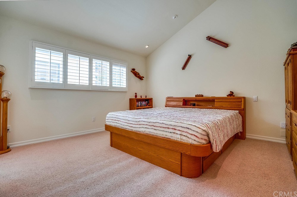 460 Peralta Avenue Long Beach, CA 90803 - Photo 17 of 42 The master bedroom has vaulted ceilings and beautiful shutters on the dual pane windows