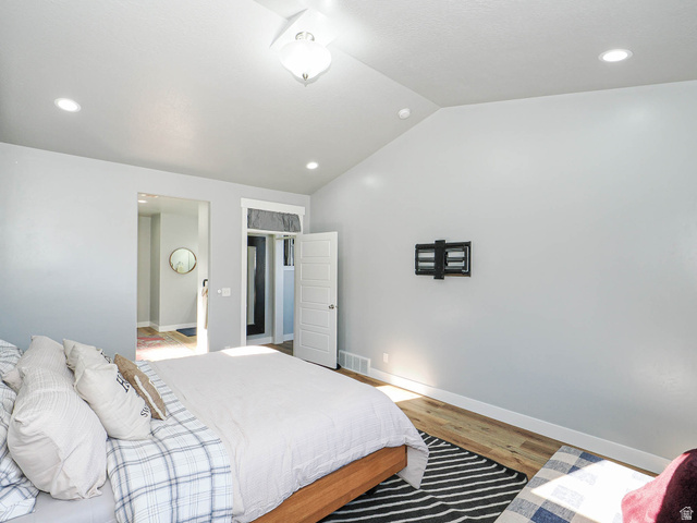 2487 Canyon Wild Road, Unit 413 Draper, UT 84020 - Photo 32 of 75 Bedroom with recessed lighting, vaulted ceiling, and light wood finished floors