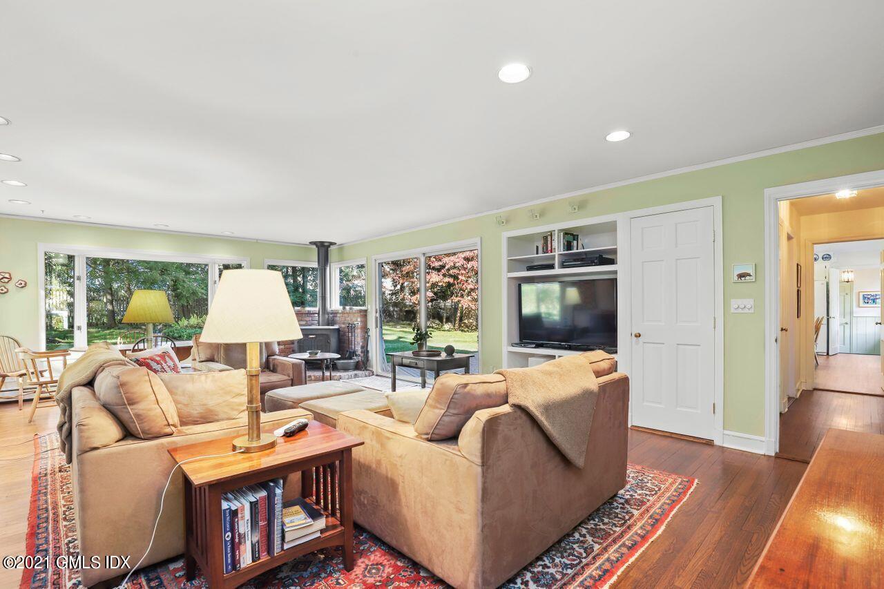 90 Winthrop Drive Riverside, CT 06878 - Photo 11 of 27 a living room with furniture and a flat screen tv