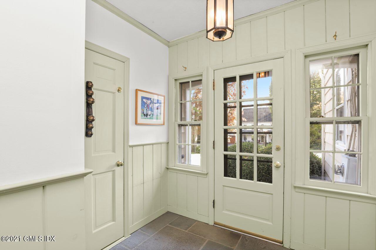 90 Winthrop Drive Riverside, CT 06878 - Photo 14 of 27 a view of a hallway with windows