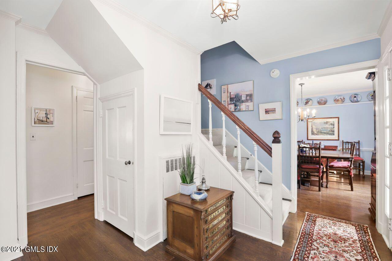 90 Winthrop Drive Riverside, CT 06878 - Photo 3 of 27 a view of entryway and hall with dining room